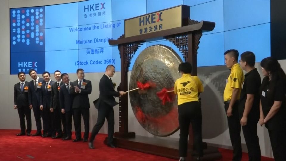 Tencent-backed Meituan jumps 5 pct on debut