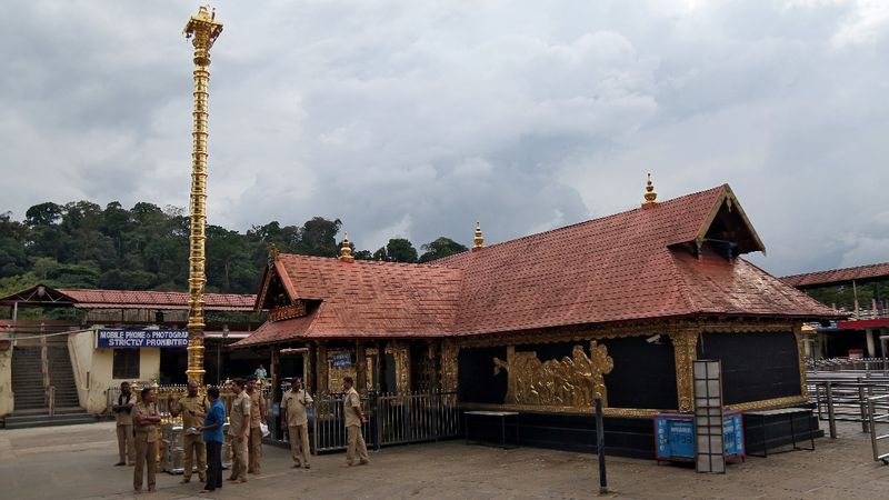 Third woman defies India temple ban amid crisis