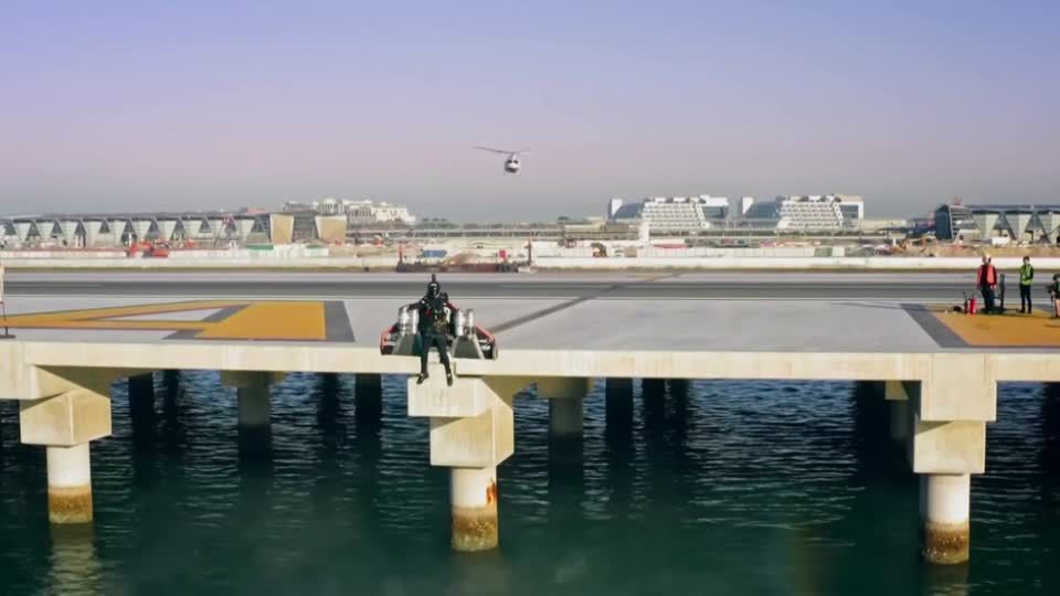 Jetpack man flies high above Dubai coastline | Reuters