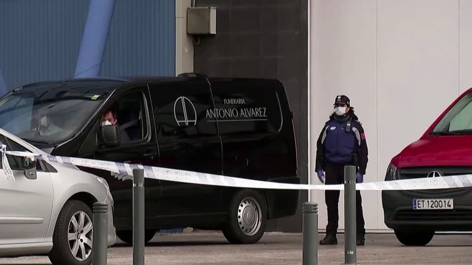 Madrid turns ice rink into morgue as death toll climbs | Reuters