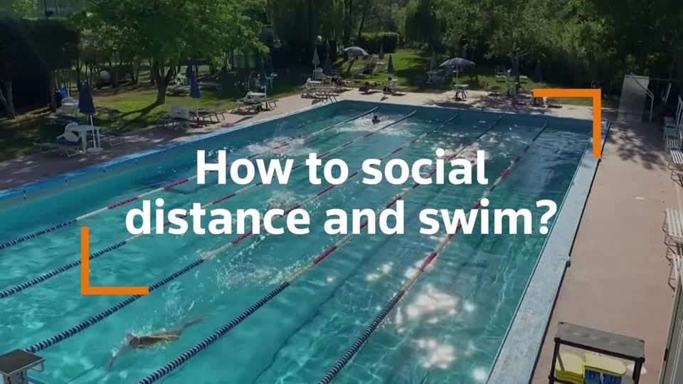 Italians try social distance swimming | Reuters