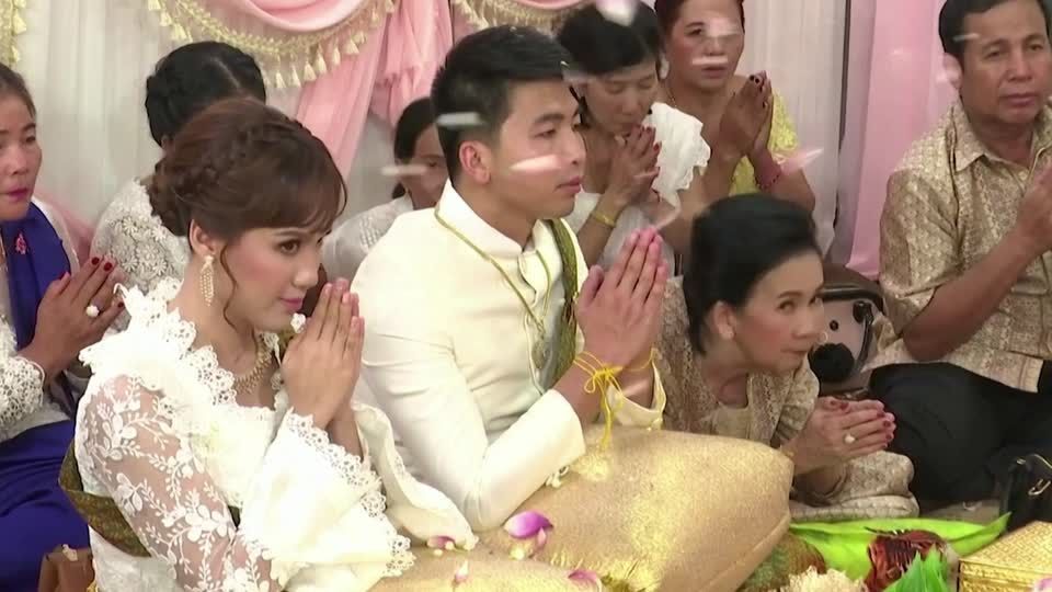Cambodian couple finally tie the knot with glittering ceremony