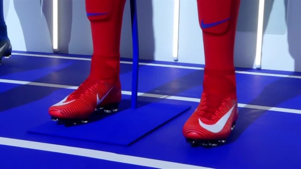 Nike shares hit record high as sales get post-lockdown boost Reuters