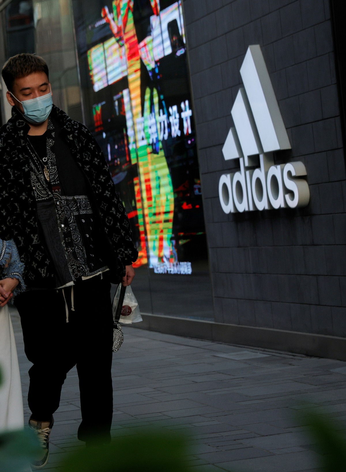 Adidas hikes outlook despite hit to China sales