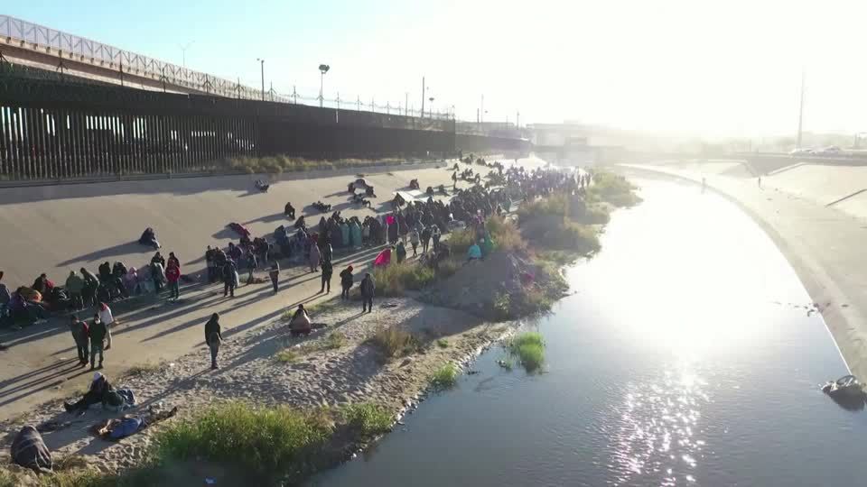 Drone footage shows long queue of migrants near U.S. border