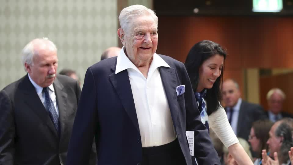 Billionaire Soros hands control of empire to son -WSJ | Reuters