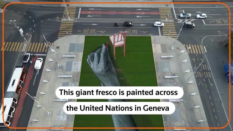 A giant fresco advocates for world without weapons | Reuters