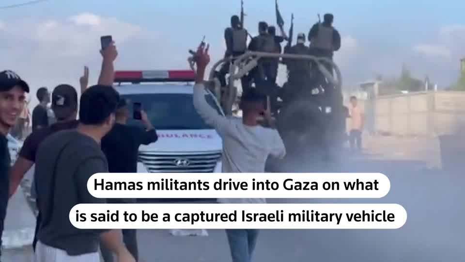 Purported captured Israeli military vehicle driven into Gaza