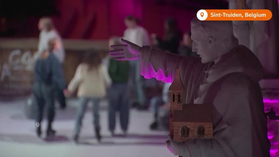 Christmas revellers ice skate down the aisle at Belgian church rink |  Reuters