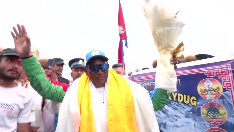 Sherpa scales Mount Everest for record 30th time | Reuters