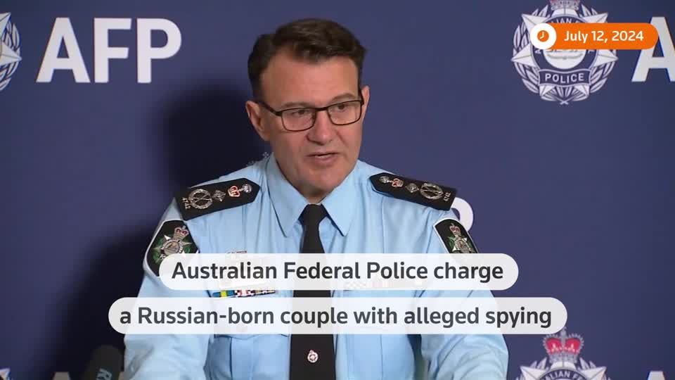 Australia charges Russian-born married couple with espionage | Reuters