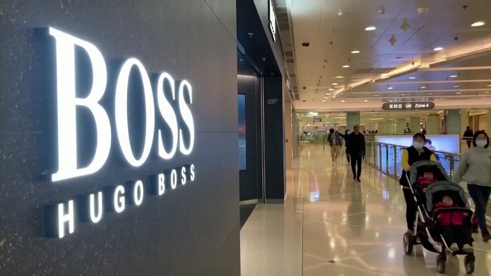 Hugo Boss cuts sales outlook again as China flags | Reuters