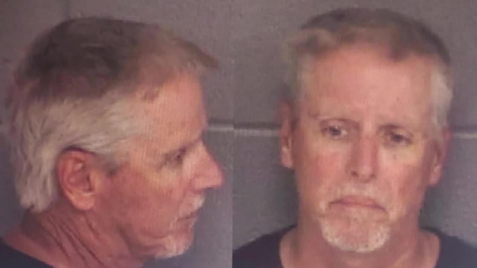 Father of Georgia shooting suspect arrested, charged with murder | Reuters
