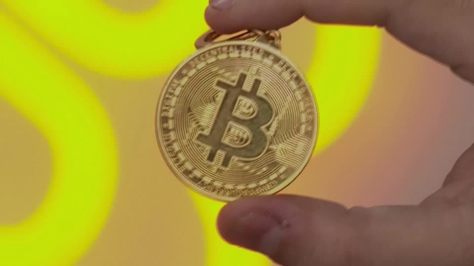 Bitcoin buyer MicroStrategy enters Nasdaq 100, shares climb | Reuters