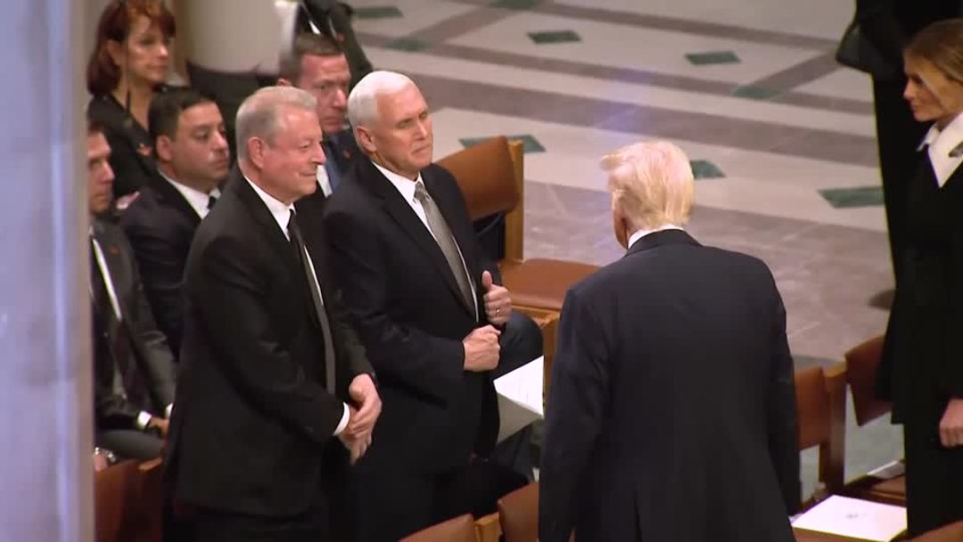Karen Pence refuses to shake Trump's hand at Jimmy Carter funeral | Reuters