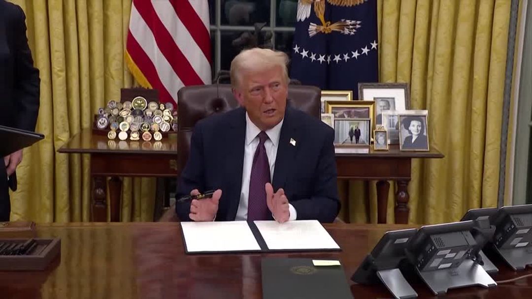 Trump aid freeze stirs chaos before it is blocked in court | Reuters