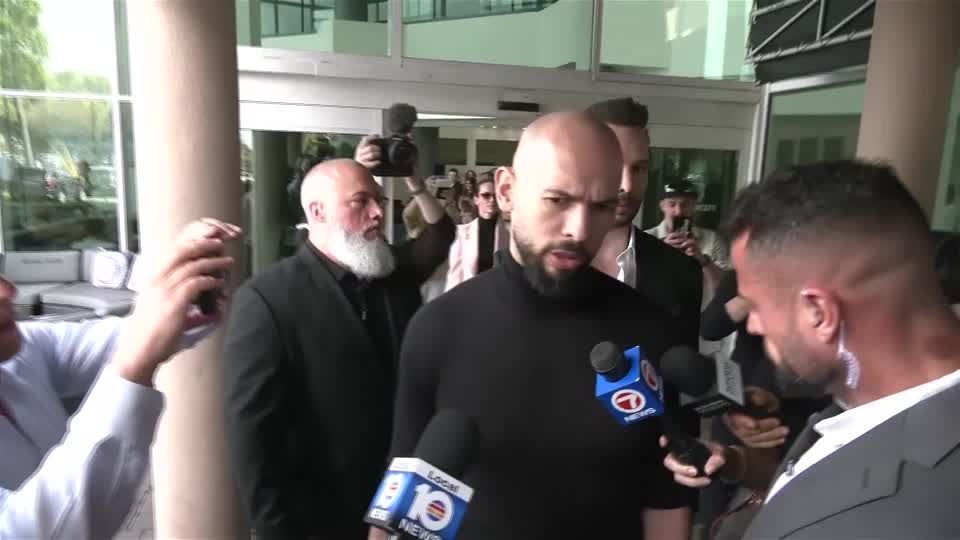 Accused trafficker Andrew Tate lands in U.S. after Romania lifts travel ban  | Reuters