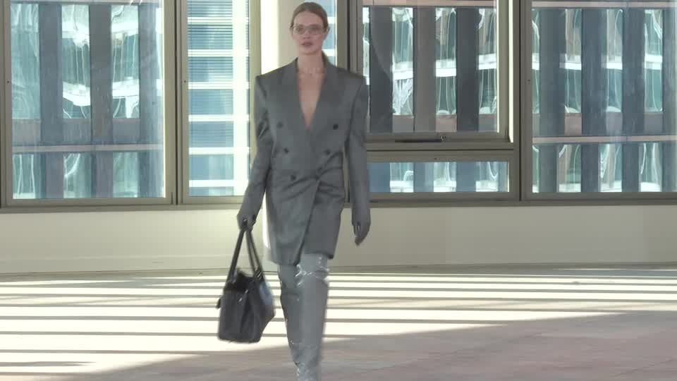 Stella McCartney shows feminine power suits in office set at Paris