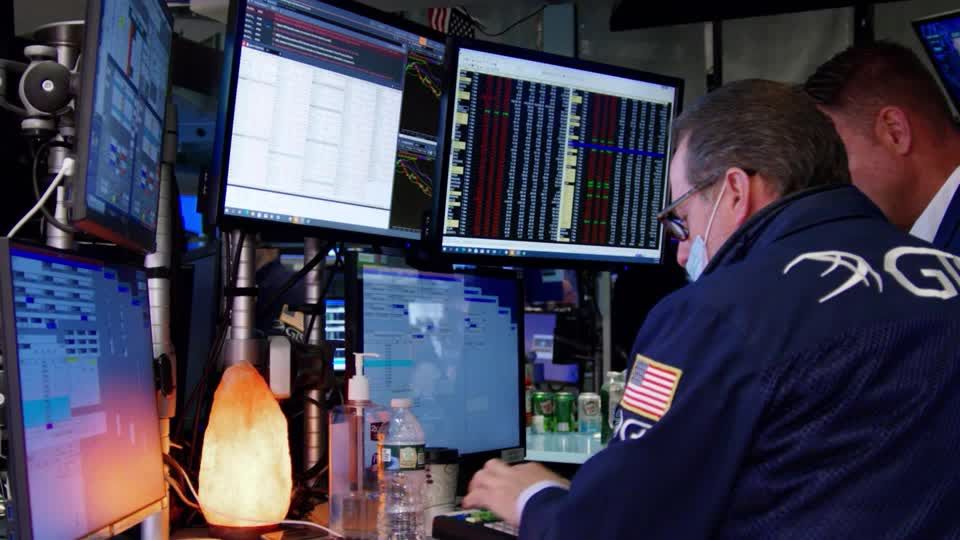 Wall St ends lower as investors digest Trump's auto tariffs | Reuters