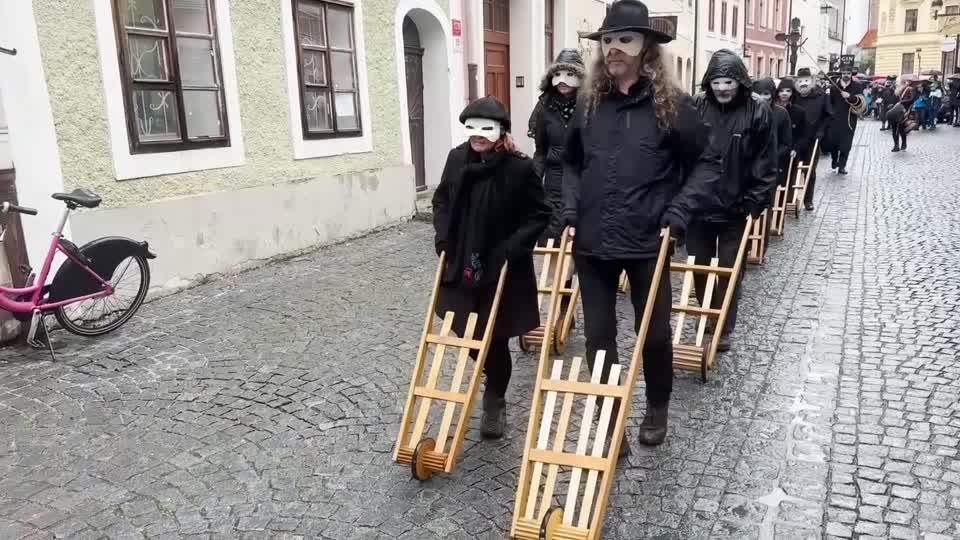 Masked marchers rattle through Czech town to mark Easter