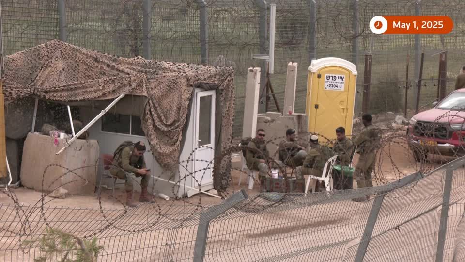 Israeli soldiers seen on border with Syria a day after strike