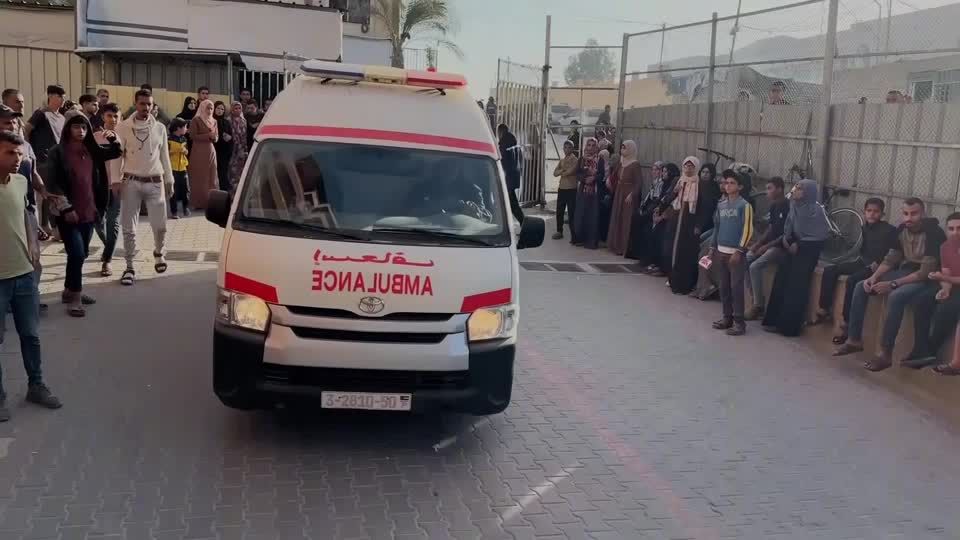 Israeli attack near aid delivery point kills dozens in Gaza | Reuters