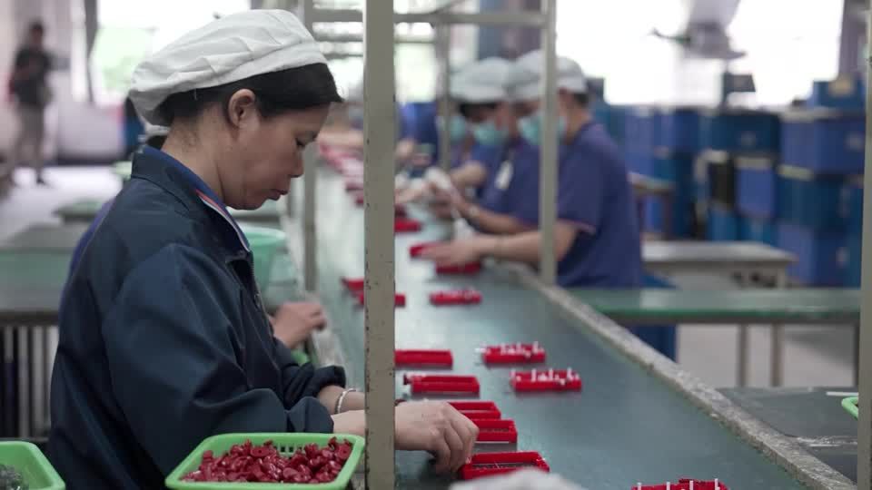 China factory activity cools in sign tariffs are starting to bite | Reuters