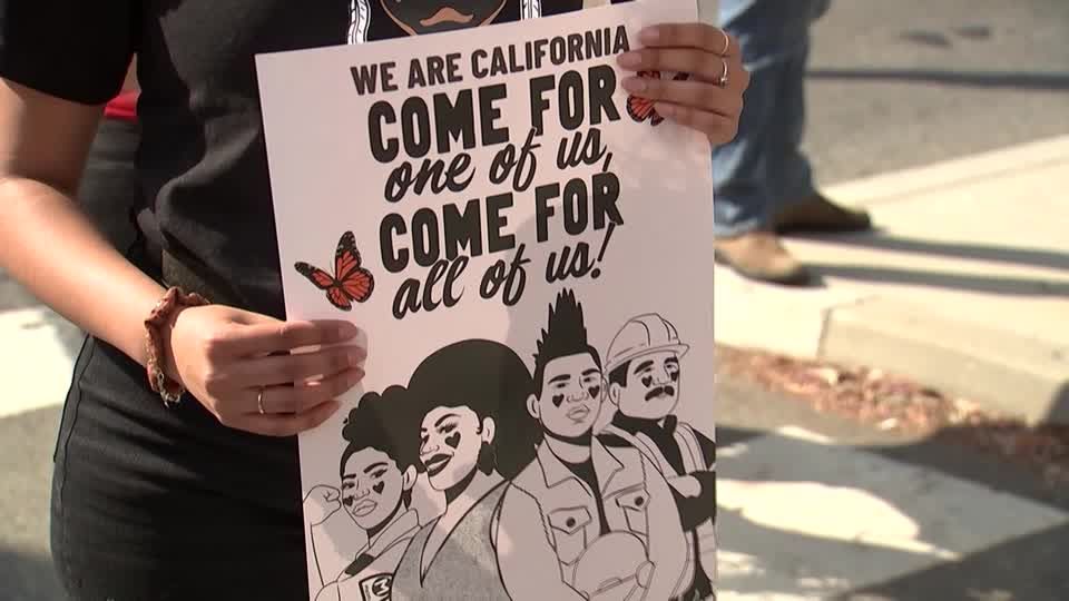 Riot police and anti-ICE protesters square off in LA after raids | Reuters