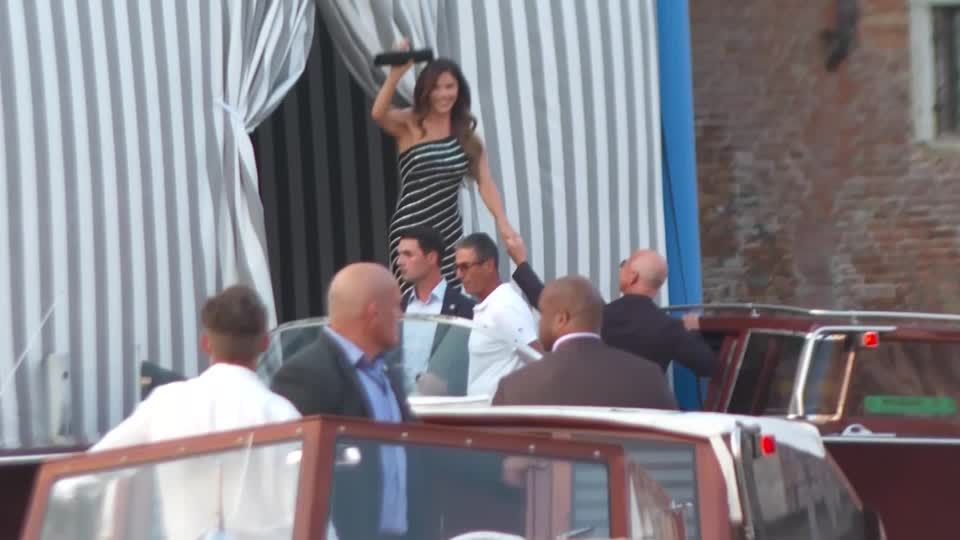 Jeff Bezos and Lauren Sanchez wave as they leave Venice hotel | Reuters
