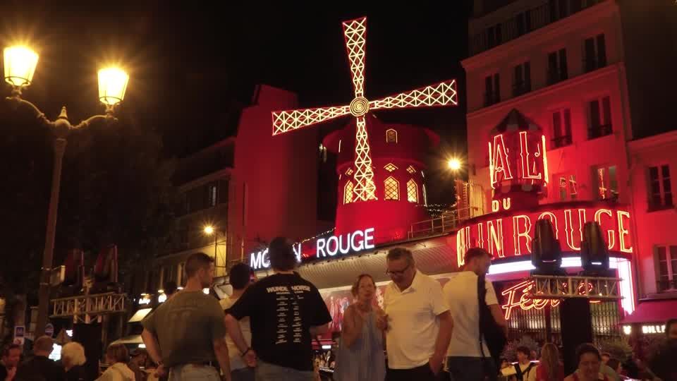 The windmill of the iconic Moulin Rouge in Paris spins again | Reuters