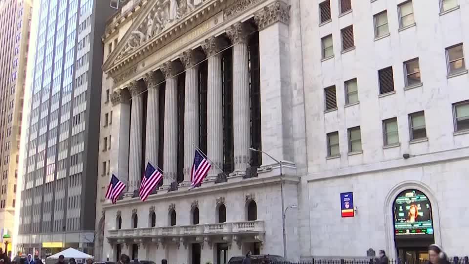 Wall St ends higher after brief slump on Powell firing confusion | Reuters
