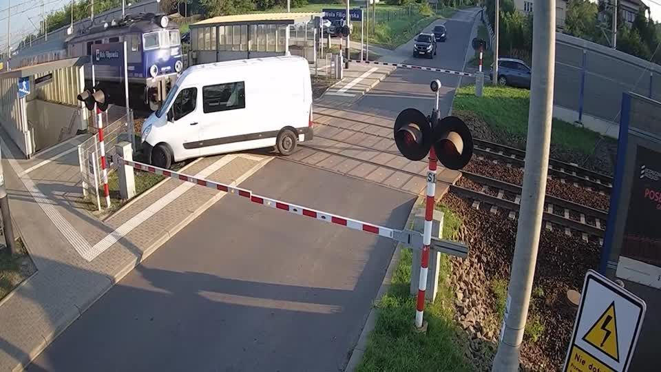 Driver unharmed after train collides with van in Poland | Reuters