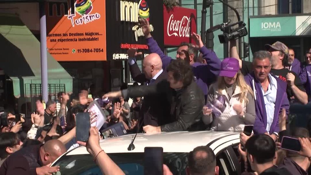 Argentina's Milei rushed from campaign event as protesters throw rocks ...