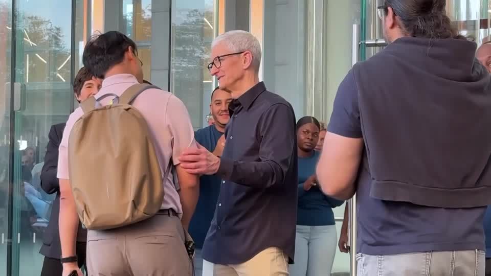 Tim Cook launches new iPhone at flagship New York store | Reuters