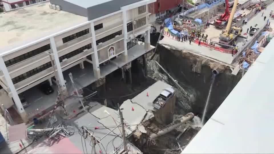Massive sinkhole in Bangkok swallows vehicle, no casualty reported