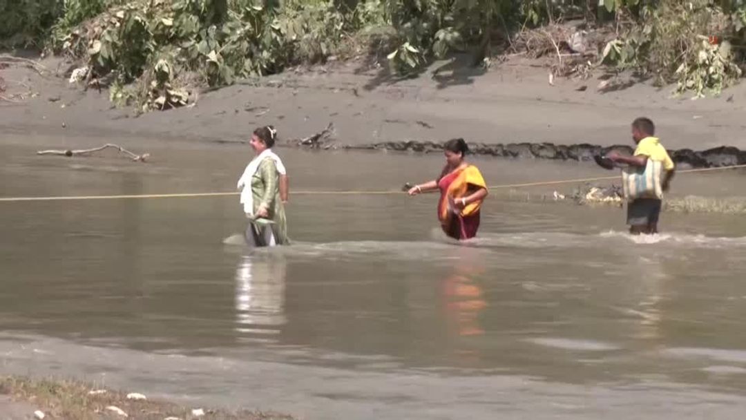 Heavy rains trigger floods, landslides killing scores in India's ...
