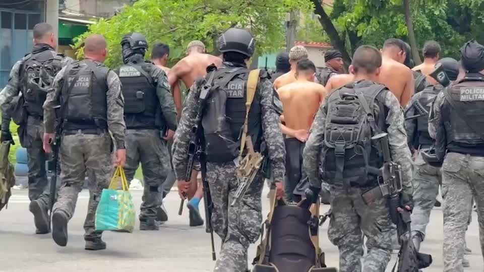 Rio police raids kill 64 ahead of climate conferences | Reuters
