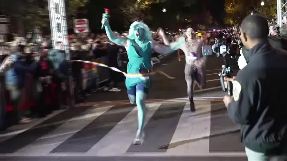 Annual high-heel drag queen race lights up Washington Halloween | Reuters