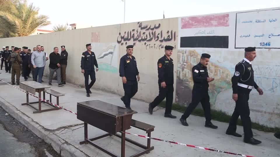Iraqi security forces cast votes before polls open to the public | Reuters
