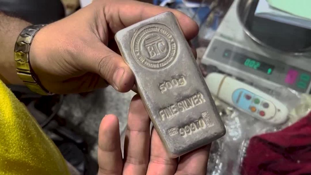 Silver crosses $77 mark while gold, platinum stretch record highs | Reuters