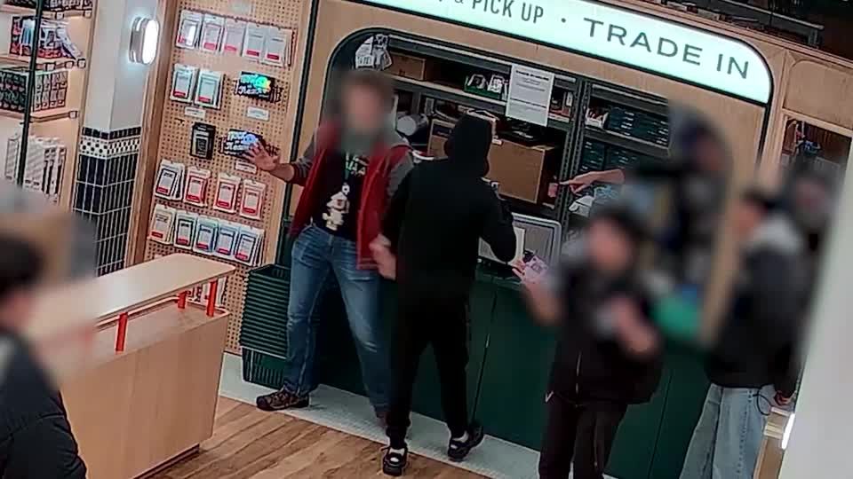 Security videos show brazen robbery in New York Pokemon card store | Reuters