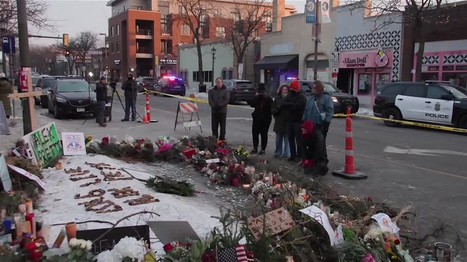 Community holds vigil for Minneapolis man killed by federal agent | Reuters