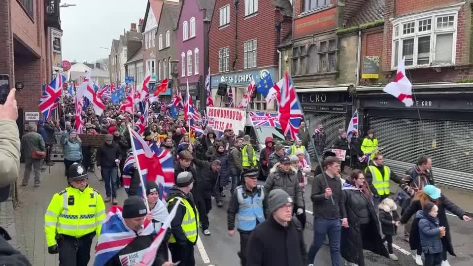 Protesters oppose housing asylum seekers in England ex-army barracks ...
