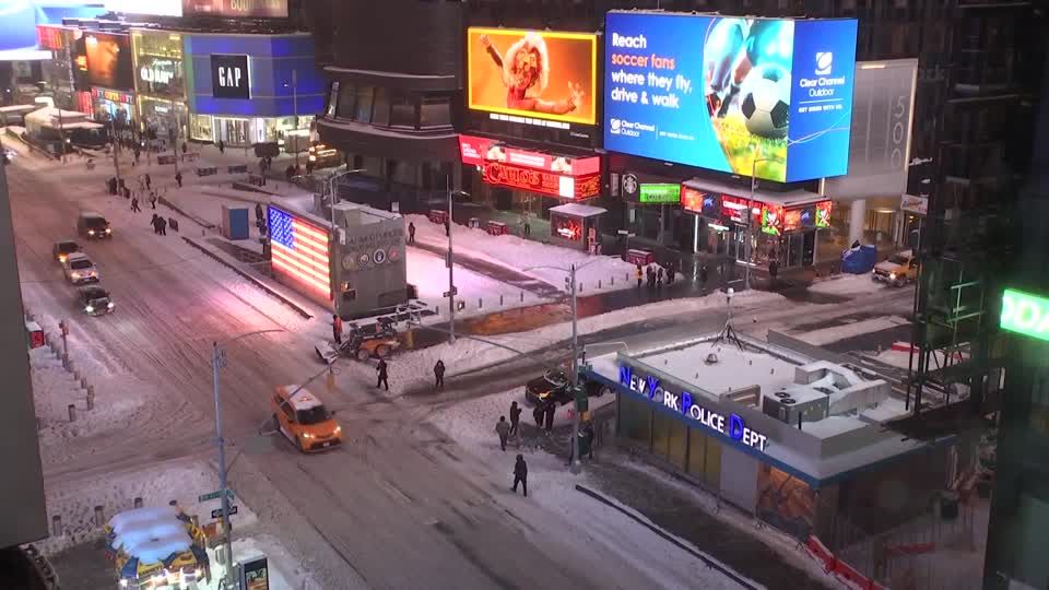 Snow blankets Times Square as winter storm grips much of US | Reuters