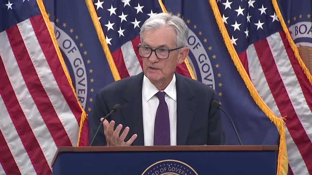 Fed leaves rates unchanged, sees 'somewhat elevated' inflation and ...