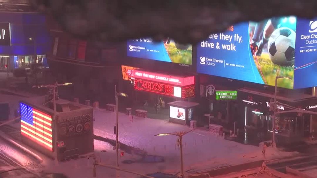 New York's Times Square covered in snow as city faces snowstorm | Reuters