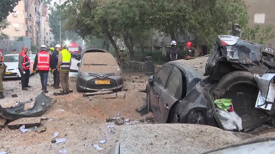 Cars damaged after Iranian cluster warheads strike near Tel Aviv