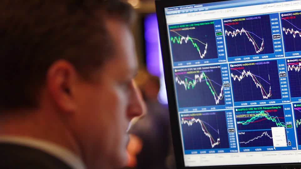 Wall Street ends sharply lower after Fed keeps rates unchanged | Reuters