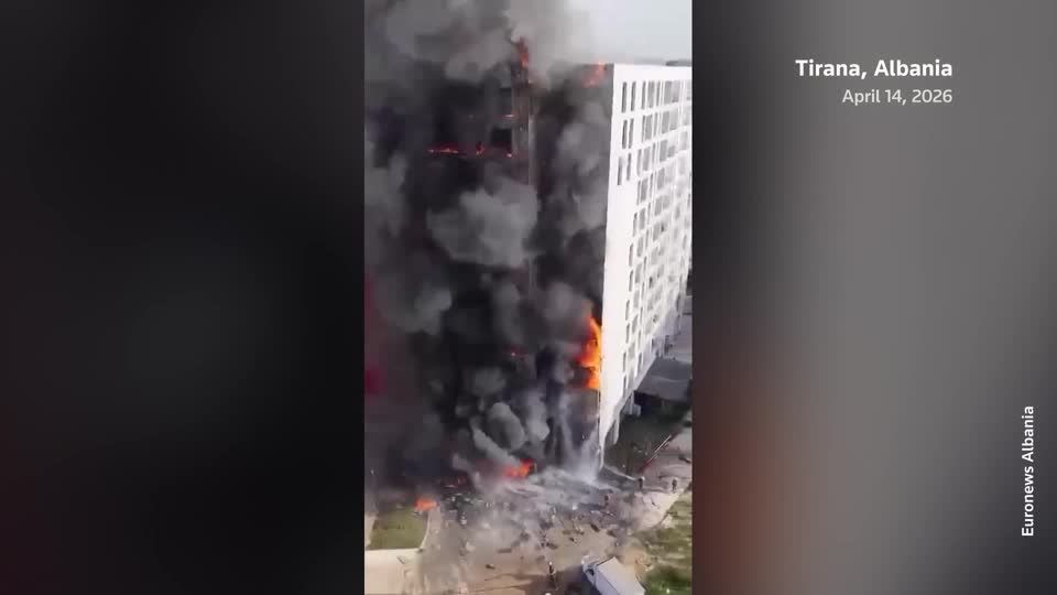 Crews battle massive fire at apartment building in Albania | Reuters