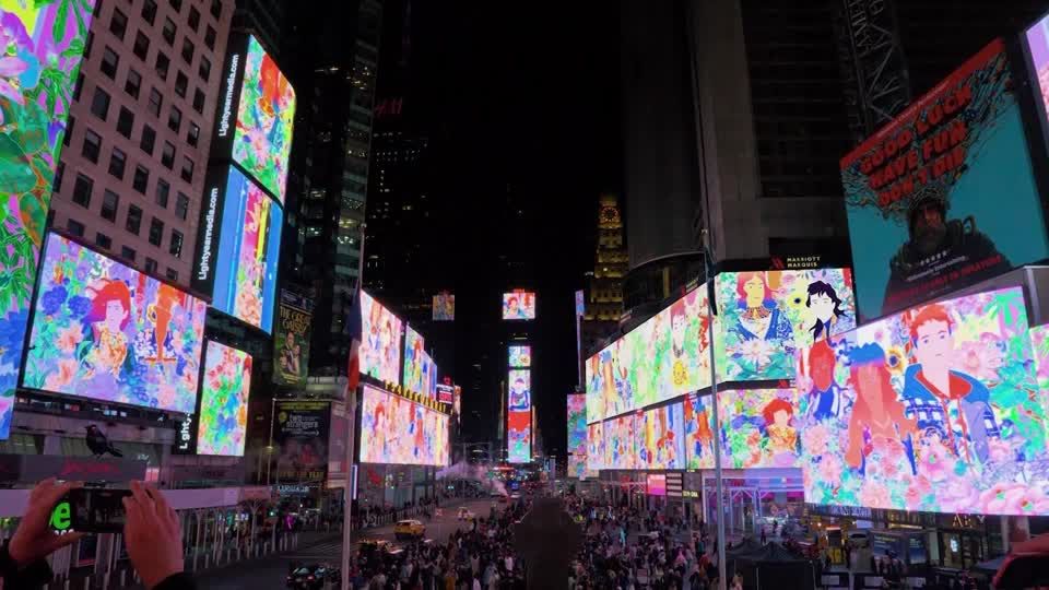 Japanese artist takes over 96 screens across Times Square | Reuters